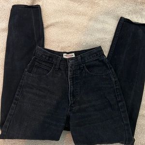 Guess Vintage mom jeans but are tighter around the thighs and high waisted